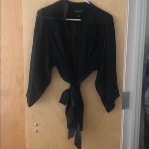 Sabina Musayev sheer black top with belt